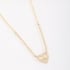 GR-01313 COLAR BANHADO A OURO 18K COM PINGENTE EM FORMATO DE CORAÇÃO EM ZIRCÔNIAS E DETALHE LOVE