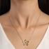 GR-01608 COLAR BANHADO A OURO 18K COM PINGENTE EM FORMATO DE FLOR COM DESIGN VAZADO