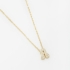 GR-01740 COLAR BANHADO A OURO 18K COM PINGENTE DE LETRA CRAVEJADO EM ZIRCÔNIAS