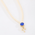 GR-02217 COLAR BANHADO A OURO 18K COM DETALHES EM PÉROLAS E PINGENTE CENTRAL OVAL