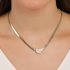 GR-02302 COLAR BANHADO A OURO 18K COM CORRENTE LAMINADA E PINGENTE DE CORAÇÃO CRAVEJADO.