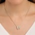 GR-02526 COLAR BANHADO A OURO 18K COM PINGENTE DE MENINO E MENINA CRAVEJADOS
