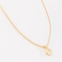GR-03007 COLAR BANHADO A OURO 18K COM PINGENTE EM FORMATO DE MÃO DE FÁTIMA E DETALHE CENTRAL EM ZIRCÔNIA