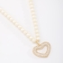 GX-0303 COLAR BANHADO A OURO 18K COM PÉROLAS E PINGENTE DE CORAÇÃO 