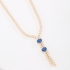 GX-0355 COLAR BANHADO A OURO 18K ESTILO GRAVATINHA COM DETALHES EM ZIRCÔNIAS E DOIS CRISTAIS LAPIDADOS AO CENTRO