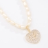 GX-0362 COLAR BANHADO A OURO 18K COM PÉROLAS E PINGENTE EM CORAÇÃO CRAVEJADO
