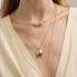 CH-0337 CHOKER DE ARO BANHADA A OURO 18K COM DETALHE CENTRAL EM PÉROLAS.