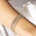 PX-0009 PULSEIRA BANHADA A OURO 18K COM ZIRCÔNIAS BAGUETE CRAVEJADAS