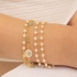 KPI-0042 KIT PULSEIRA INFANTIL BANHADA A OURO 18K COM PÉROLAS