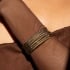 BL-00062 BRACELETE BANHADO A OURO 18K COM DESIGN TORCIDO E FORMATO ABERTO