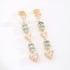 OUTB-14880 BRINCO BANHADO A OURO 18K COM PEDRAS LAPIDADAS EM FORMATO TRILLION E OVAIS