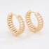 OUTBTR-0515 BRINCO BANHADO A OURO 18K EM FORMATO DE ARGOLA COM DETALHES CRAVEJADOS EM ZIRCÔNIAS