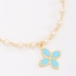 PI-00104 PULSEIRA COM DETALHES EM PÉROLAS E PINGENTE DE FLOR