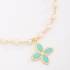 PI-00104 PULSEIRA COM DETALHES EM PÉROLAS E PINGENTE DE FLOR