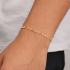PR-0044 PULSEIRA BANHADA A OURO 18K COM CORRENTE EM ELO GRUMET 