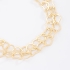 PU-00112 PULSEIRA COM ELOS ENTRELAÇADOS EM CORAÇÃO