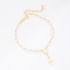 PU-00149 PULSEIRA COM DETALHES EM PÉROLAS E PINGENTE RELIGIOSO E CRUZ