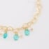 PU-00247 PULSEIRA ELOS EM CORAÇÃO E PINGENTES DE CRISTAIS GOTAS E DETALHES DE PÉROLAS
