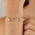 PU-00304 PULSEIRA BANHADA A OURO 18K COM PINGENTES DE CONCHAS, BUZIOS