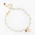 PU-00346 PULSEIRA COM PÉROLAS EM CORAÇÃO E PINGENTES DE CORAÇÃO 