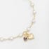 PU-00346 PULSEIRA COM PÉROLAS EM CORAÇÃO E PINGENTES DE CORAÇÃO 