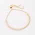 PU-00383 PULSEIRA GRAVATINHA COM DETALHES EM ZIRCÔNIAS BAGUETE ESTILO FITA