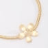 PU-00408 PULSEIRA BANHADA A OURO 18K COM CORRENTE TIPO MALHA FLEXÍVEL EM FORMATO DE FLOR
