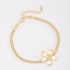 PU-00408 PULSEIRA BANHADA A OURO 18K COM CORRENTE TIPO MALHA FLEXÍVEL EM FORMATO DE FLOR