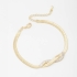 PU-00523 PULSEIRA COM DESIGN TORCIDO E DETALHES EM ZIRCÔNIAS