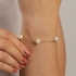PU-00569 PULSEIRA BANHADA A OURO 18K COM PÉROLAS ESPAÇADAS NA CORRENTE