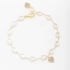 PU-00637 PULSEIRA COM PÉROLAS E PINGENTES DE CORAÇÃO CRAVEJADOS EM ZIRCÔNIAS