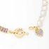 PU-00639 PULSEIRA COM CORAÇÃO E DETALHES EM PÉROLAS