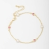 PU-00693 PULSEIRA COM DETALHES EM PÉROLAS E PEDRAS EM CORAÇÃO