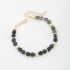 PU-00771 PULSEIRA COM ESFERAS FACETADAS EM PEDRAS COLORIDAS E DETALHES DOURADOS