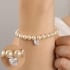 PU-00777 PULSEIRA EM PÉROLAS E ZIRCÔNIA