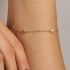 PU-00847 PULSEIRA BANHADA A OURO 18K COM PÉROLAS E ESFERAS LISAS INTERCALADAS
