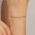 PU-00856 PULSEIRA AJUSTÁVEL COM DETALHES EM PÉROLAS