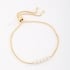 PU-00856 PULSEIRA AJUSTÁVEL COM DETALHES EM PÉROLAS