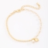 PU-00873 PULSEIRA COM PINGENTES DE PÉROLA E CORAÇÃO