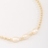 PU-00879 PULSEIRA COM DETALHES EM PÉROLAS E ESFERAS