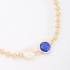 PU-00882 PULSEIRA COM DETALHES EM PÉROLA E PEDRA LAPIDADA COLORIDA