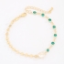 PU-00939 PULSEIRA BANHADA A OURO 18K COM DETALHES EM PEDRAS LAPIDADAS COM VARIEDADE DE CORES E PÉROLA CENTRAL