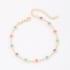 PU-00947 PULSEIRA BANHADA A OURO 18K COM PEDRAS COLORIDAS EM FORMATO REDONDO