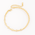 PU-00950 PULSEIRA BANHADA A OURO 18K COM DESIGN ASSIMÉTRICO DE ESFERAS E ZIRCÔNIAS