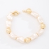 PU-00951 PULSEIRA BANHADA A OURO 18K COM DETALHES EM PÉROLAS IRREGULARES E ESFERAS
