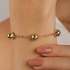 PU-00976 PULSEIRA BANHADA A OURO 18K COM CORRENTE DE ELOS INTERCALADOS POR ESFERAS