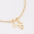 PU-01026 PULSEIRA BANHADA A OURO 18K COM CORRENTE TORCIDA E PINGENTES DE MENINA