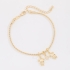 PU-01029-PULSEIRA BANHADA A OURO 18K COM PINGENTES DE DUAS MENINAS E CORAÇÃO CRAVEJADO EM ZIRCÔNIAS