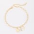 PU-01038 -PULSEIRA BANHADA A OURO 18K COM ELOS TRABALHADOS E PINGENTES DE SÃO BENTO