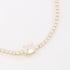 PU-01049 PULSEIRA RIVIERA COM ZIRCÔNIAS CRAVEJADAS E DETALHE CENTRAL EM GOTA